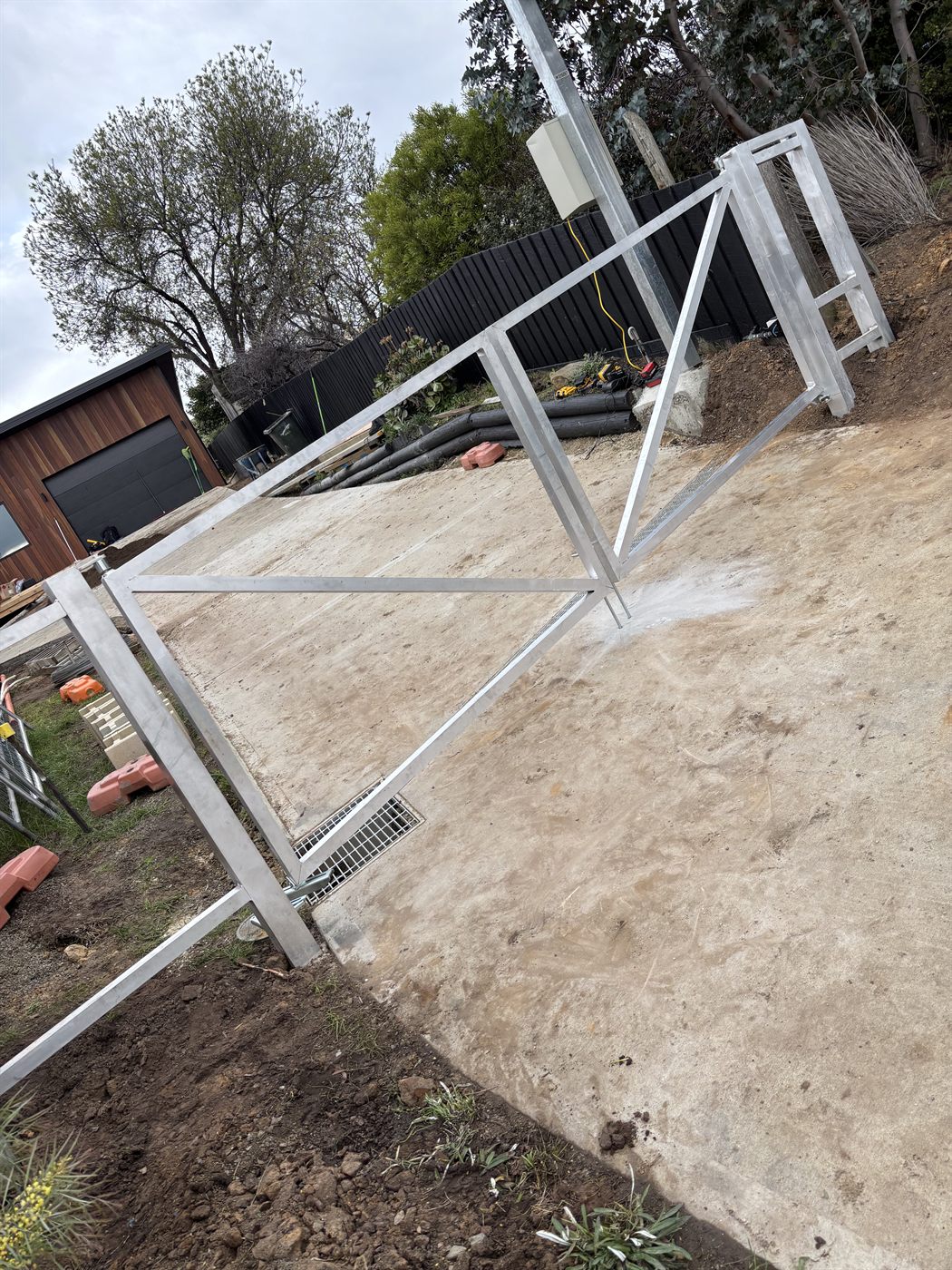 Galvanised gate frame during installation