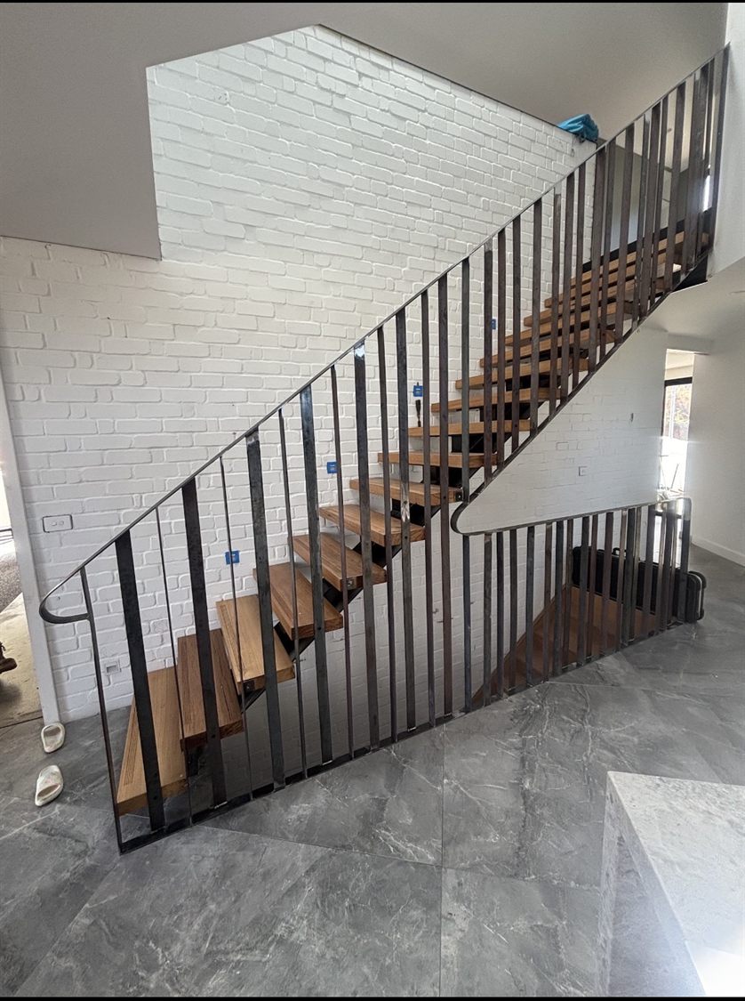 Hand-formed steel stair balustrade